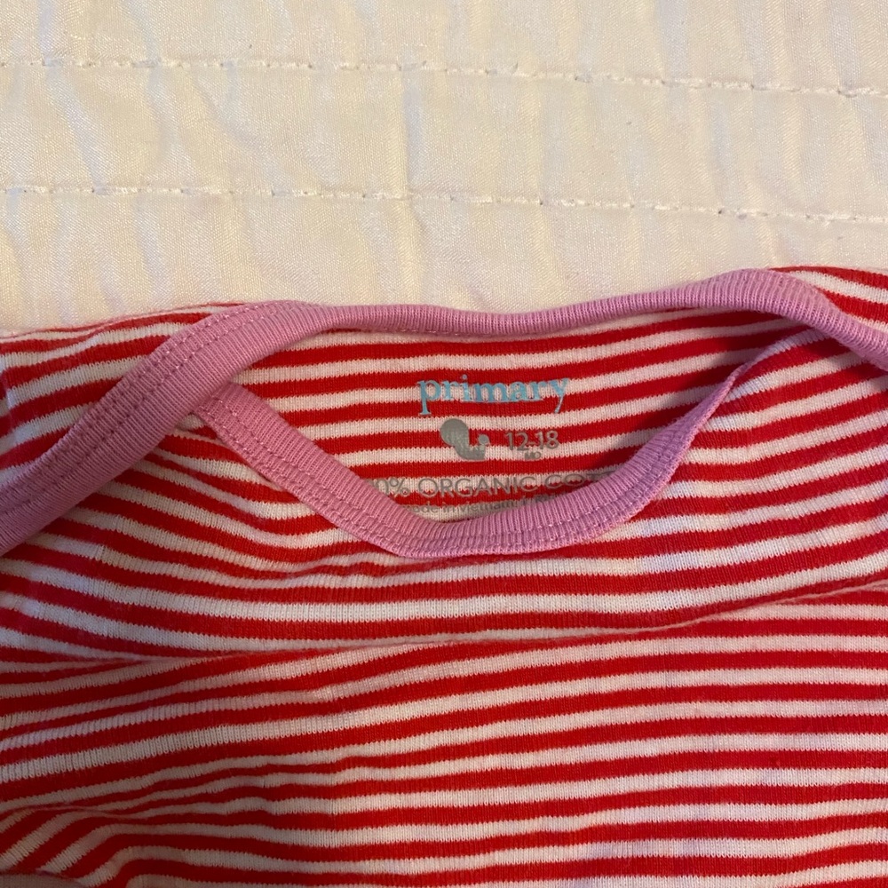 Red and white striped pink collar long sleeved onesie primary